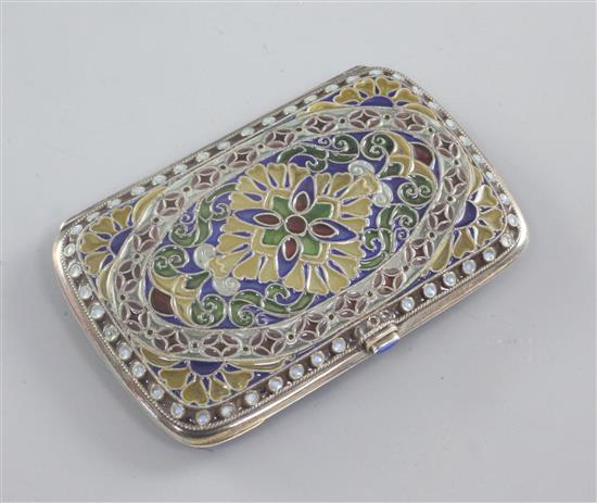 An early 20th plique a jour enamel and silver gilt cigarette case, probably Russian, with import mark for Henry James Hulbert